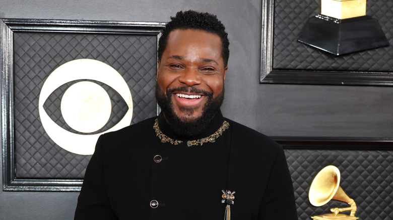 Malcolm-Jamal Warner smiling