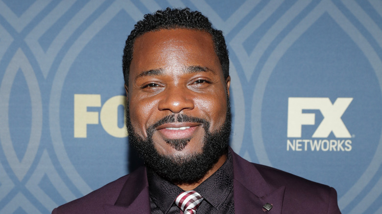 Malcolm-Jamal Warner smiling