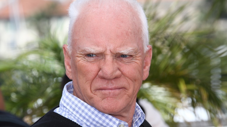 Malcolm McDowell grimacing 