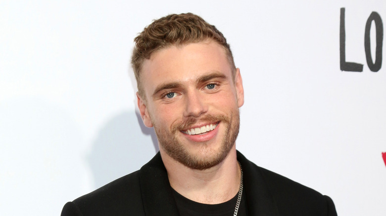 Gus Kenworthy posing at an event