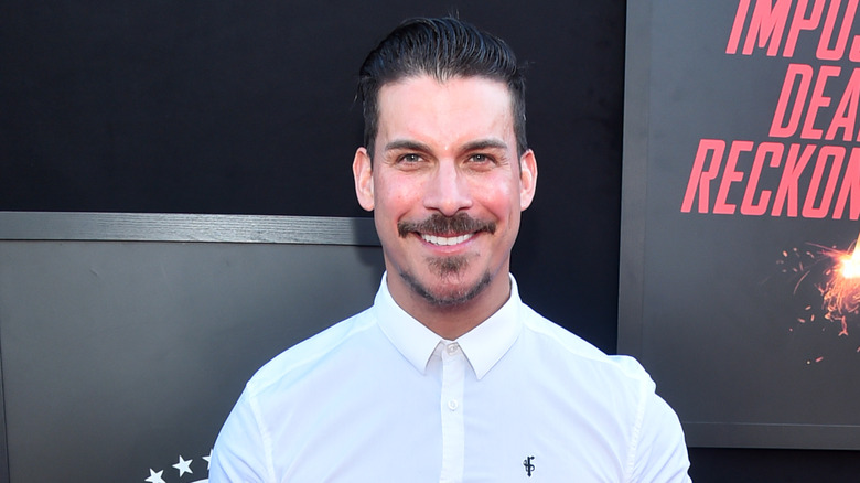 Jax Taylor posing on a red carpet