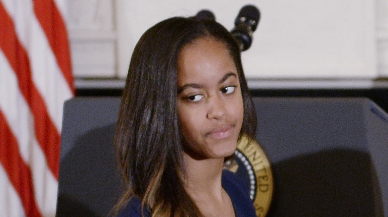 Malia Obama looking askance in close-up