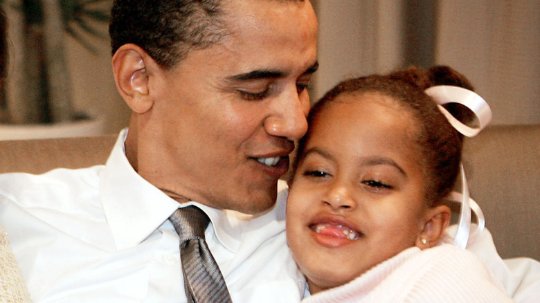 Malia Obama with father Barack Obama