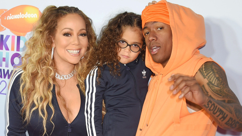 Mariah Carey, Monroe Cannon and Nick Cannon posing together at the Nickelodeon Kids Choice Awards.