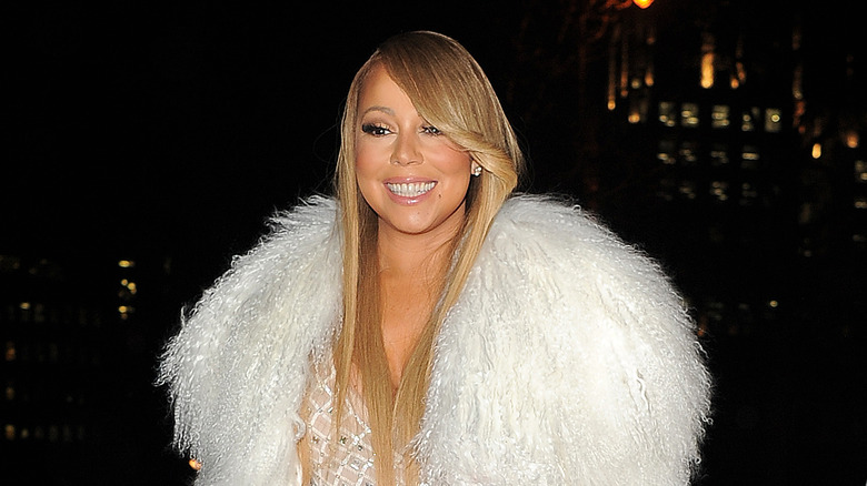 Mariah Carey white fluffy jacket