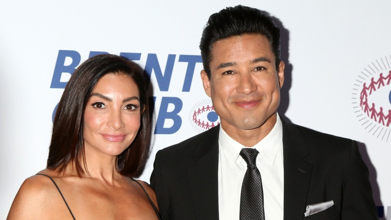 Mario Lopez and Courtney Mazza smiling