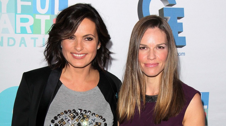 Mariska Hargitay and Hilary Swank smiling