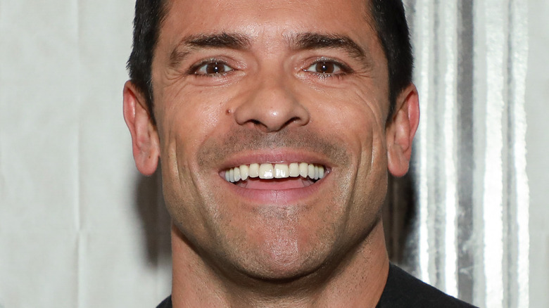 Mark Consuelos smiles