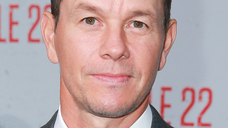 Mark Wahlberg in suit not smiling