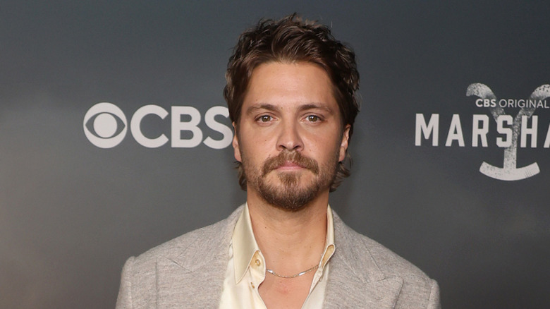 Luke Grimes posing at an event in 2026