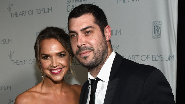 Arielle Kebbel and Aaron Bay-Schuck pose together in 2015