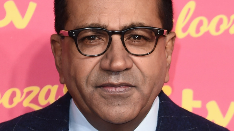 Martin Bashir wearing glasses