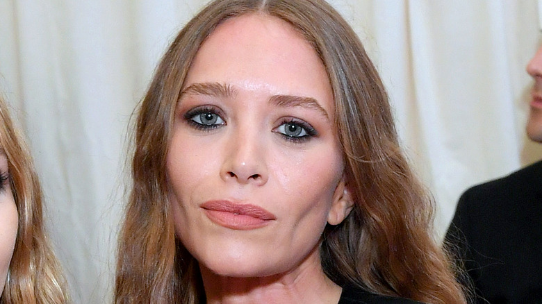 Mary-Kate Olsen wears a black leather outfit in 2019