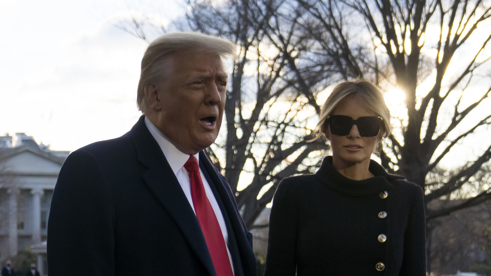 Donald Trump and Melania Trump leaving the White House