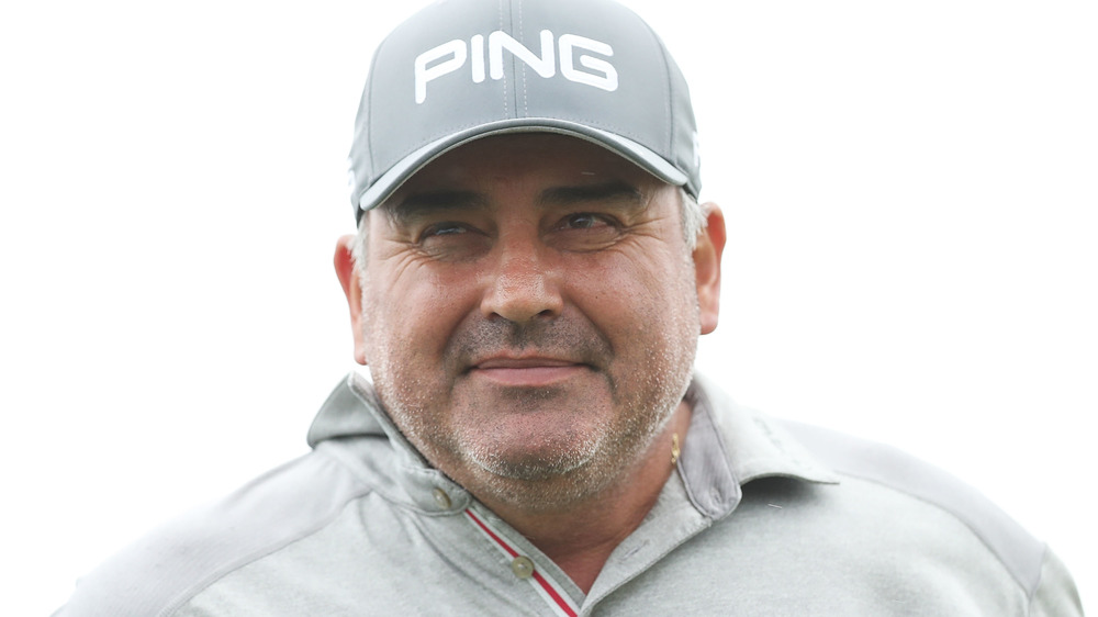 Angel Cabrera golfing in a gray baseball cap