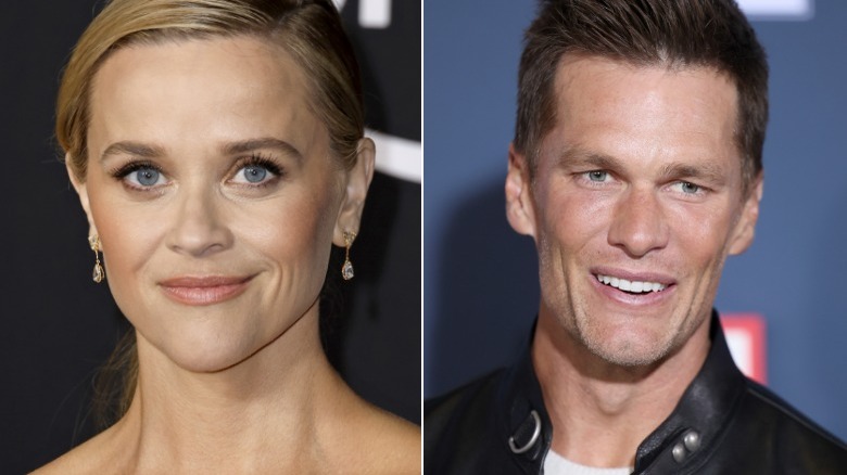 Reese Witherspoon and Tom Brady posing