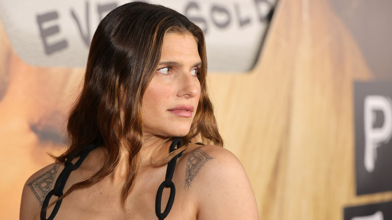 Lake Bell looks over shoulder