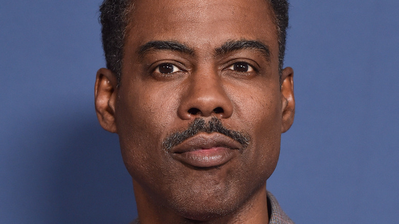 Chris Rock pursing lips