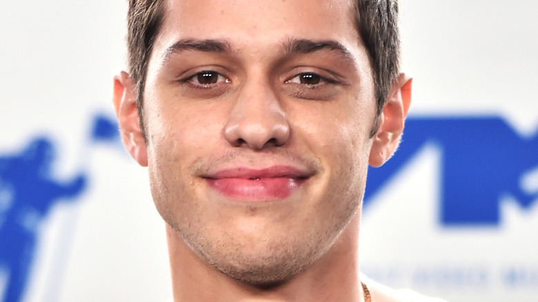 Pete Davidson smiling red carpet 