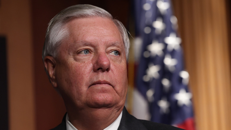 Lindsey Graham looks into the distance