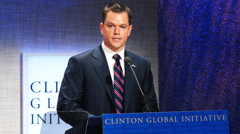 Matt Damon speaking at a podium