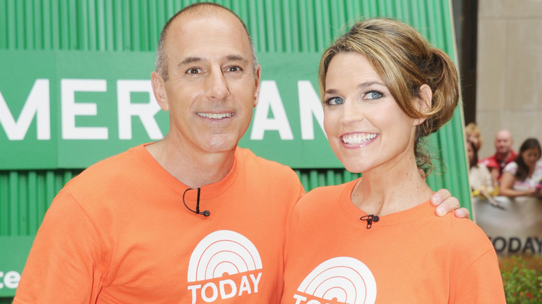 Matt Lauer and Savannah Guthrie posing for a photo