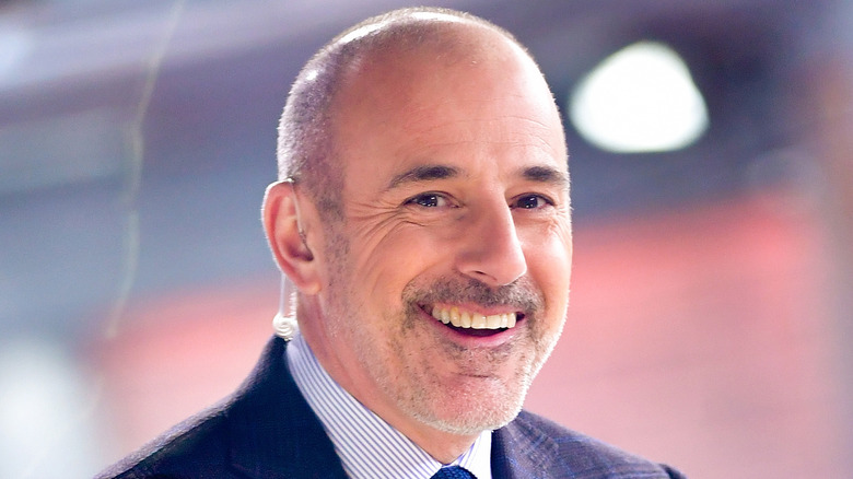 Matt Lauer grinning widely on the set of "The Today Show"