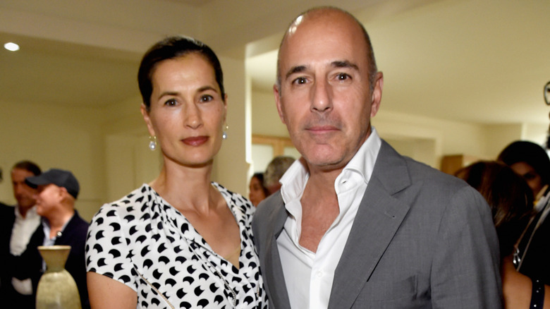 Matt Lauer poses with Annette Roque in 2017