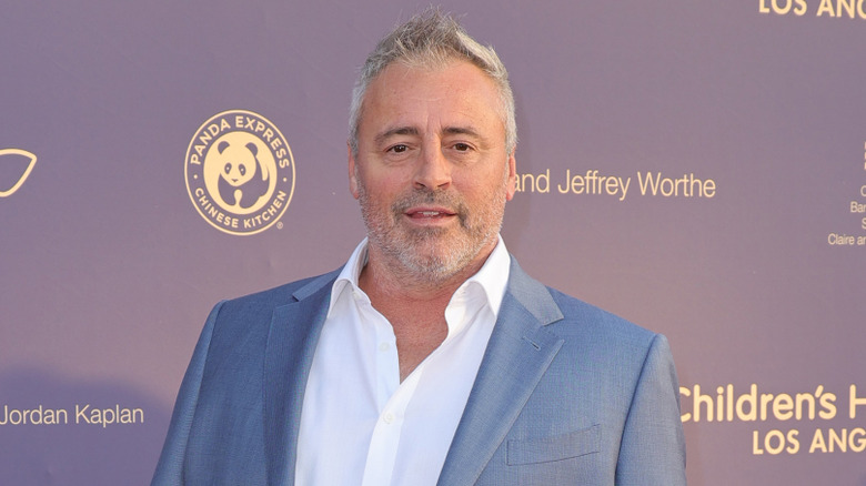 Matt LeBlanc wearing a blue suit