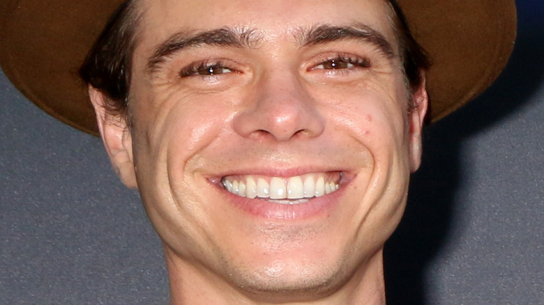 Matthew Lawrence smiling with hat