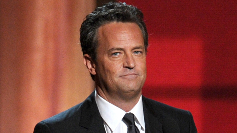 Matthew Perry smirking