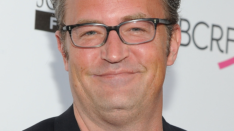 Matthew Perry wearing glasses