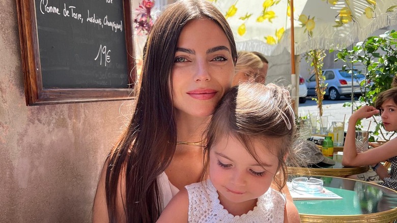 Kelly Piquet and her daughter 