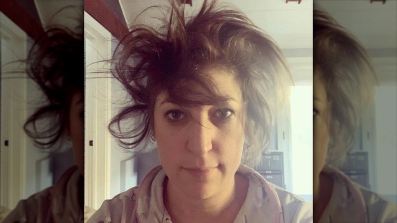 Mayim Bialik poses with disheveled short hair