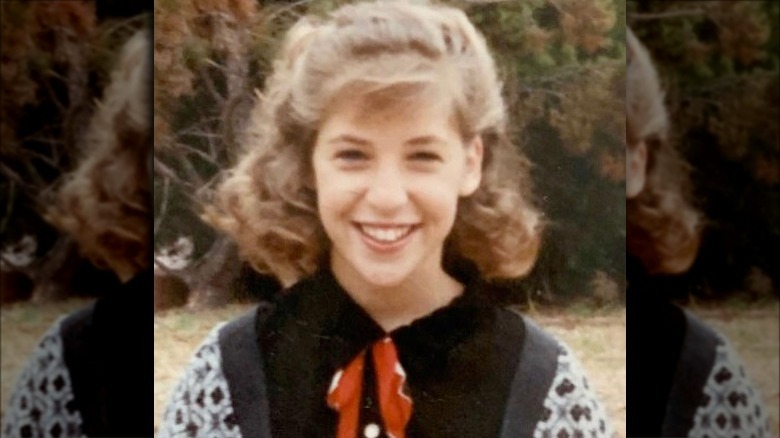 Young Mayim Bialik posing for photo