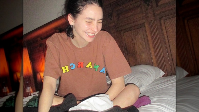 Meadow laughing in bed in 2023