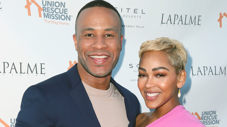 DeVon Franklin and Meagan Good smiling 