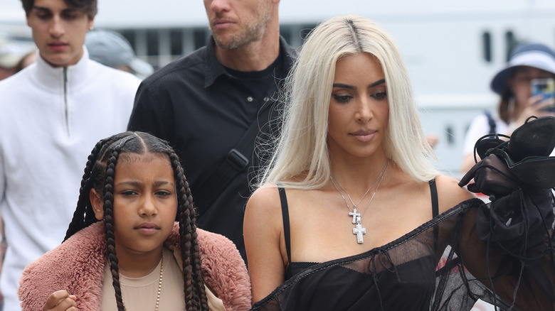 North West and Kim Kardashian walking