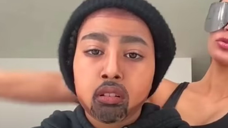 North West poses as Kanye West