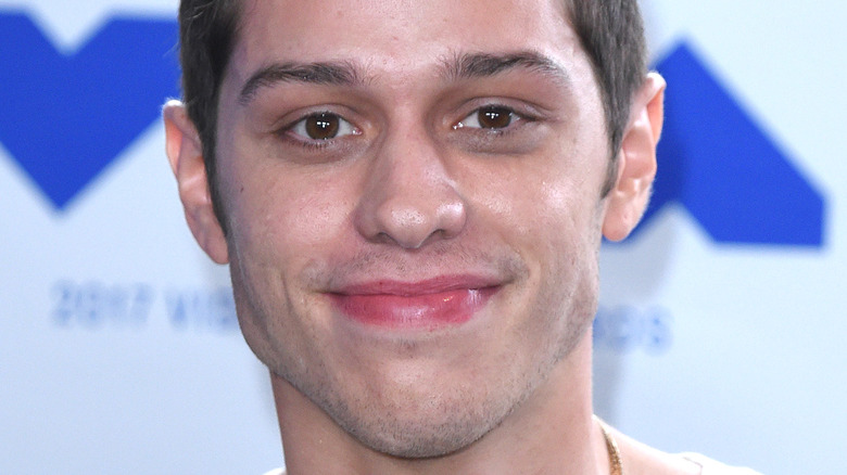 Pete Davidson smiles