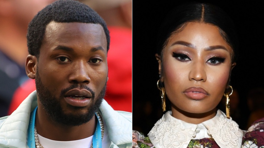 Meek Mill and Nicki Minaj staring at camera