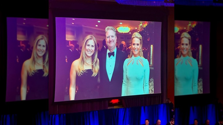 Martha Maccallum posing with her husband and daughter