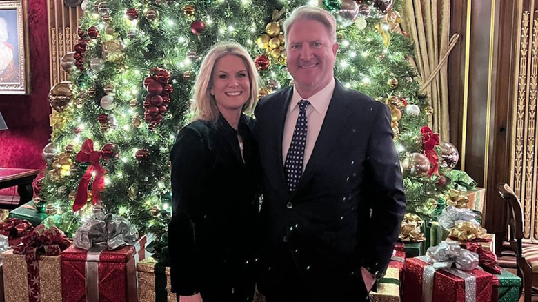 Martha MacCallum and Daniel John Gregory posing with Christmas tree