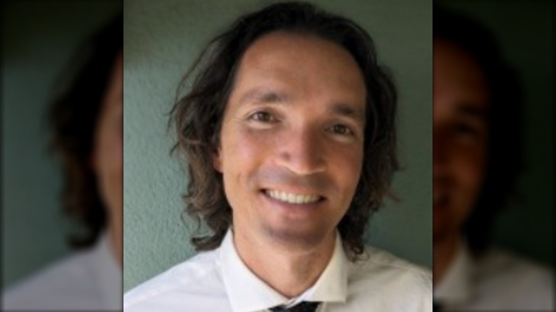 Christopher Peck smiling for his LinkedIn profile picture.