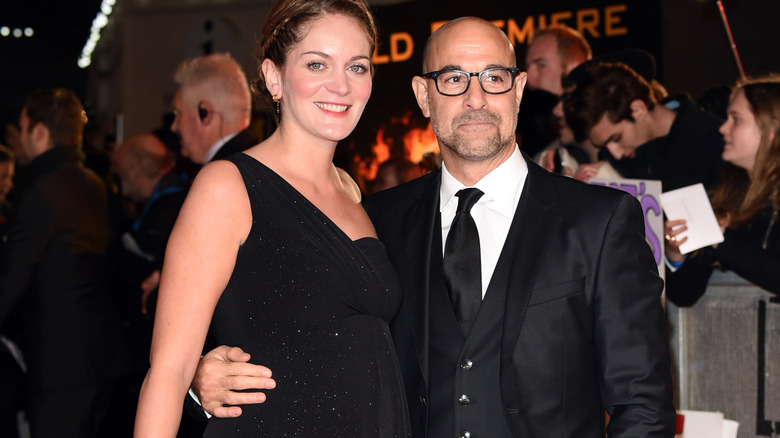 A pregnant Felicity Blunt and Stanley Tucci in November 2014.
