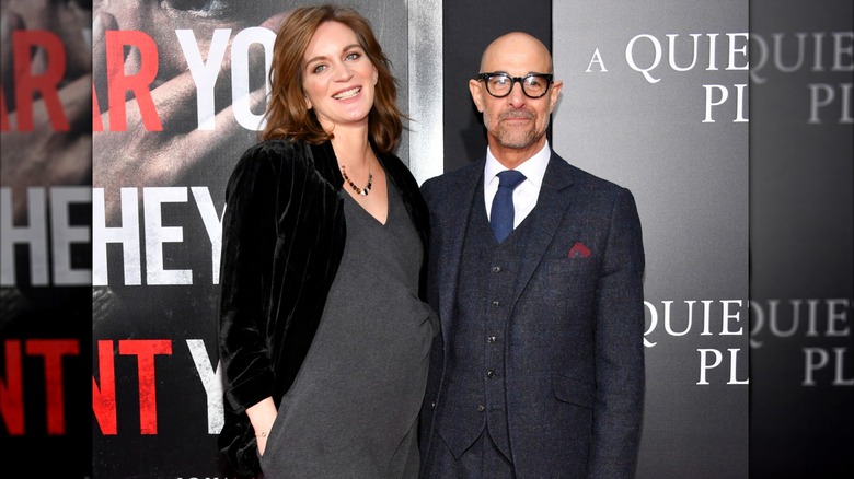 A pregnant Felicity Blunt and Stanley Tucci on a 2018 red carpet.