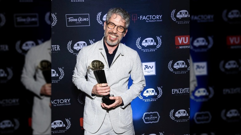 Paul smiling with trailer award