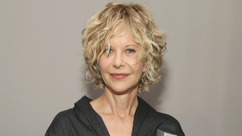 Meg Ryan smirking curly hair