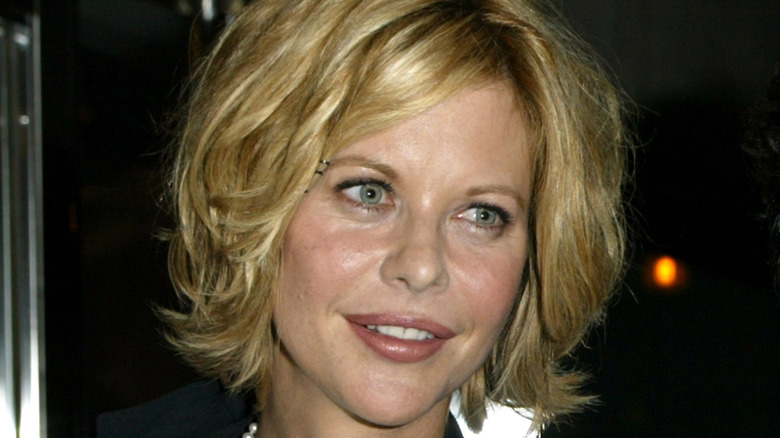 Meg Ryan smirking red carpet