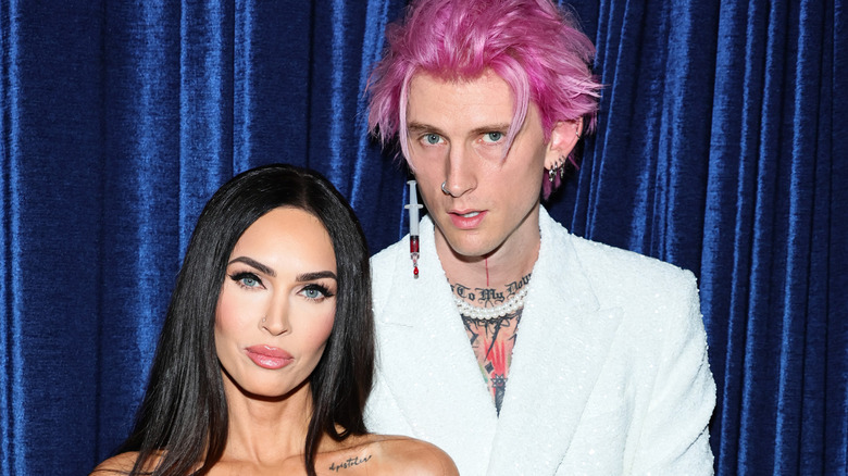 Machine Gun Kelly and Megan Fox posing